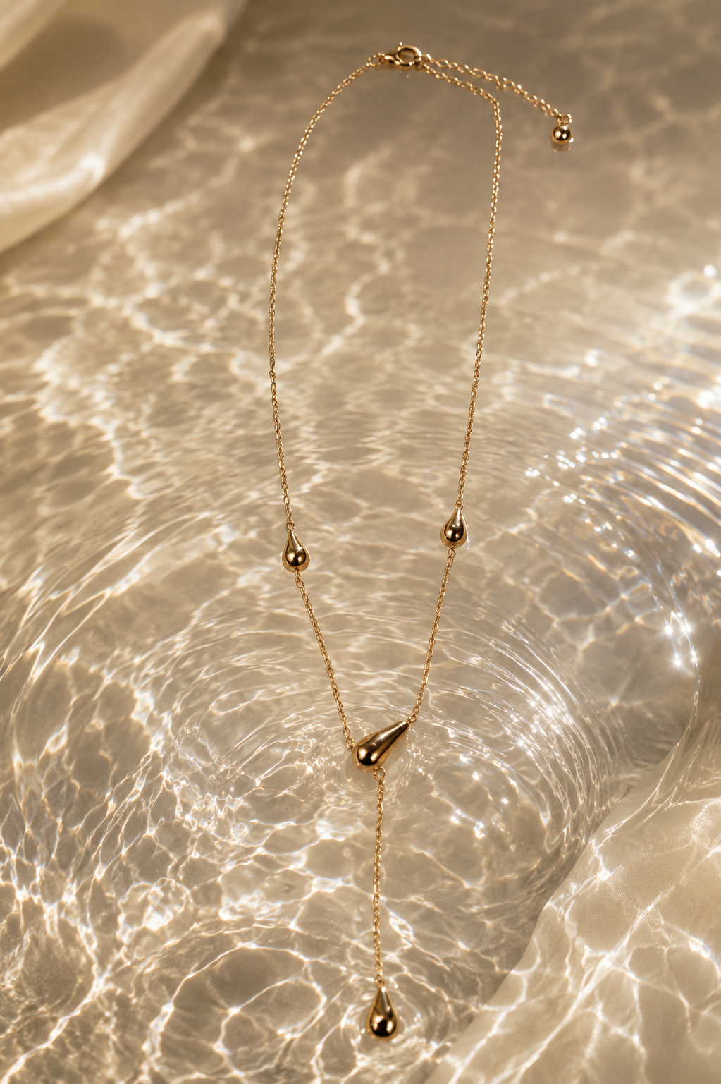 Gold Teardrop Lariat Necklace